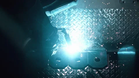 Metal worker welding in dark work shop - high contrast slow motion Vídeo Stock 168464877