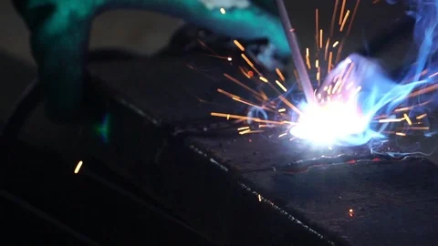 Metal worker welding iron in a workshop  Video stock 119913890