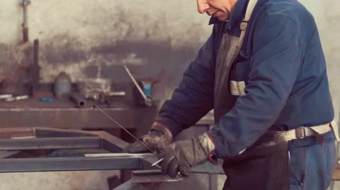 Metal Worker Working in factory Stock Footage 61168501