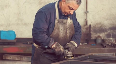 Metal Worker Working in factory Stock Footage 62258912