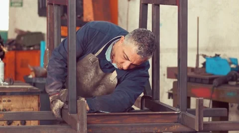 Metal Worker Working in factory Stock Footage 62259078