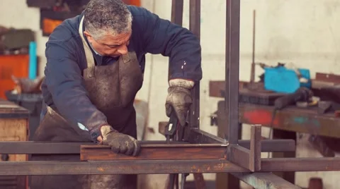 Metal Worker Working in factory Stock Footage 62259089