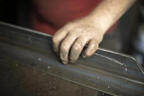 Metal in the workshop. Steel processing. Stock Photos
