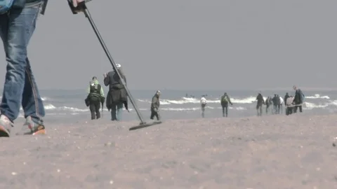 Metaldetector on the beach Stock Footage 74289659