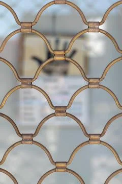 Metalic roller shutter in a closed shop. A hand shape shows that it is closed Stock Photos