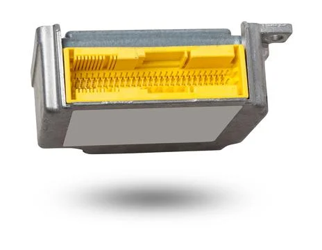 Metall car engine control unit on a white isolated background is the connec.. Foto stock