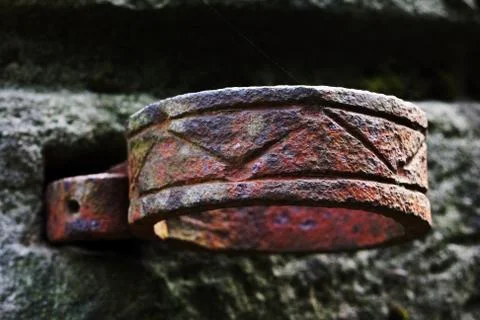 Metall ring in a stone wall. Stock Photos