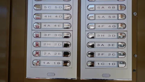 Metallic apartment intercom panels with sunlight reflecting outdoors, displ.. Stock Footage 311524273