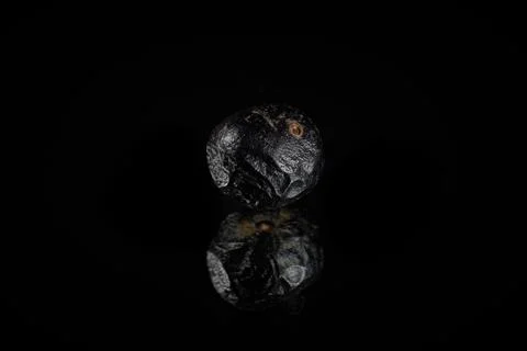 Metallic Asteroid 3D Rendering reflecting Over a shiny Black Background 스톡 일러스트