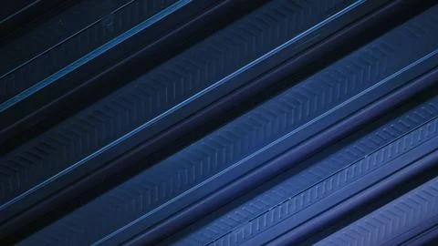 A metallic black background with parallel lines, creates high-tech concept Stock Photos