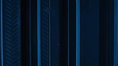 A metallic black background with parallel lines, creates high-tech concept Stock Photos