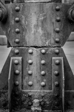 Metallic braces with rivets and rust Stock Photos