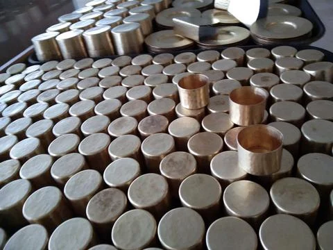 The metallic caps on the table Stock Photos