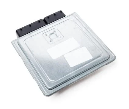 Metallic car engine control unit with plastic elements on a white isolated ba Stock Photos