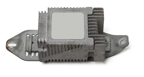 Metallic car engine control unit with plastic elements on a white isolated ba Stock Photos