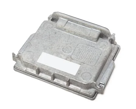 Metallic car engine control unit with plastic elements on a white isolated ba 스톡 사진