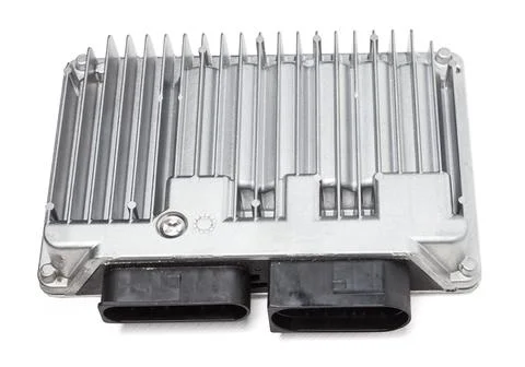 Metallic car engine control unit with plastic elements on a white isolated ba Stock Photos