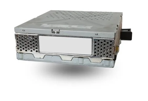 Metallic car engine control unit with plastic elements soaring on a white iso 스톡 사진