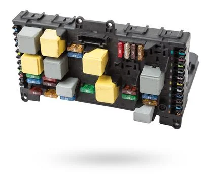 Metallic car engine control unit with plastic elements soaring on a white i.. Foto stock