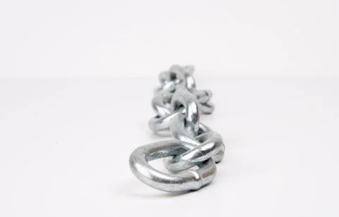 Metallic chain on white background Foto stock