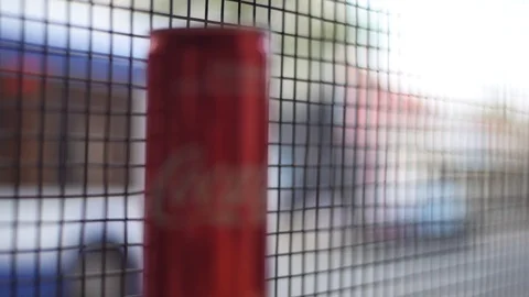Metallic coca cola can moving focus Stock Footage 112869296