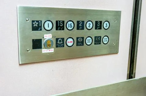 Metallic Elevator control panel with push buttons to floor or occupants Stock Photos