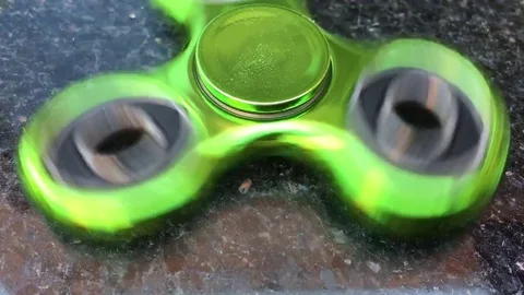 Metallic Fidget Spinner Stock Footage 76406479