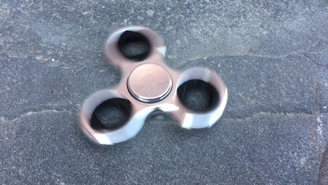 Metallic Fidget Spinner Stock Footage 76406563