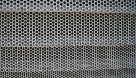 Metallic gray background texture pattern of metal mesh vehicle macro Stock Photos