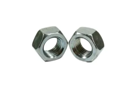 Metallic hexagonal nuts Stock Photos