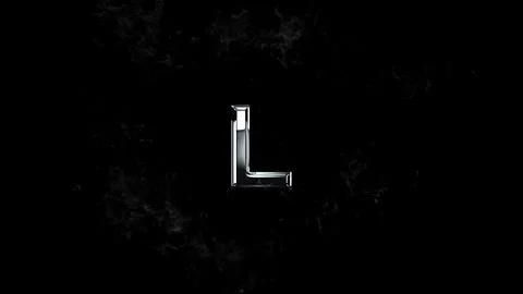Metallic letter L floating in the center of a circular swirling smoke cloud 库存影片 343576097