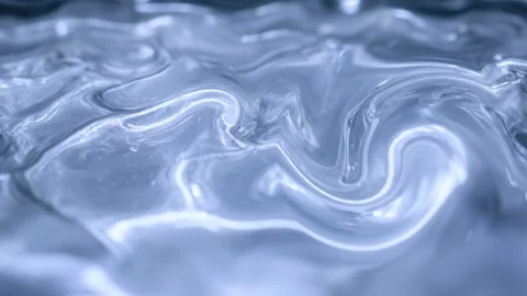 Metallic liquid surface gently moving and reflecting light Stock Footage 301499208