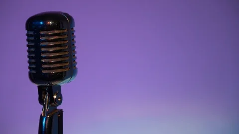Metallic microphone for record or speak to audience on stage in dark club close. Stock Footage 118528357