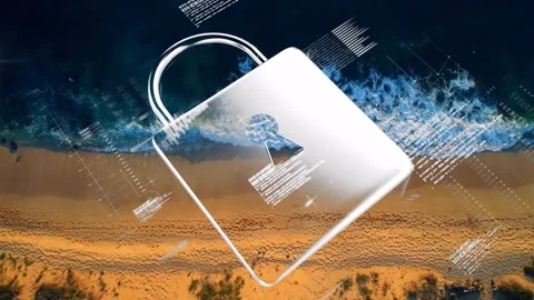 Metallic padlock fading into view over beach, rotating with digital code Stock Footage 330052703