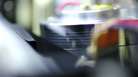 Metallic parts of outdated video playing equipment Stock Footage 259838268