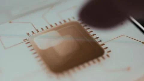 Metallic processor chip with AI styling connected to fine circuit traces Stock Footage 342489291