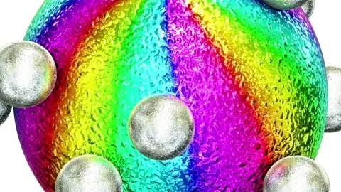Metallic rainbow gradient striped sphere with rolling silver metallic spheres Video stock 219833054