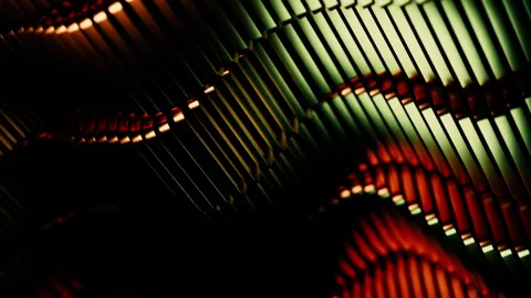 Metallic Ribbed Motion. Warm Highlights And Shadows Form Rhythmic Textured Stock Footage 333795516