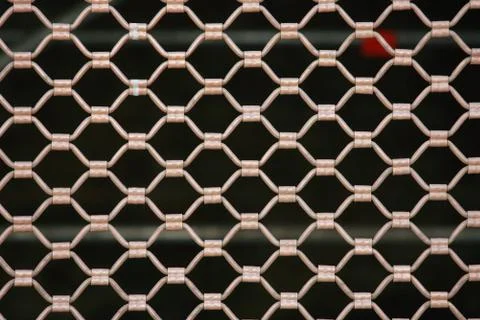Metallic security net with black background Foto stock