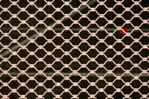 Metallic security net with black background Stock Photos
