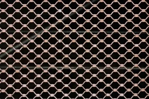 Metallic security net with black background Stock Photos