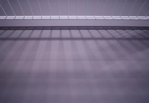 Metallic shelf with dramatic shadows interior background Foto stock