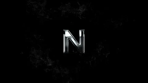 Metallic silver letter N surrounded by a swirling circular cloud of white smo Stock Footage 343576333