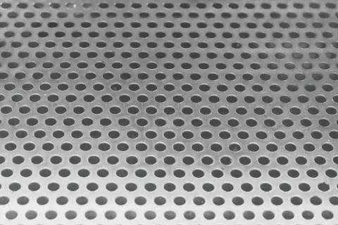 Metallic Silver Perforated Grid Stock Photos