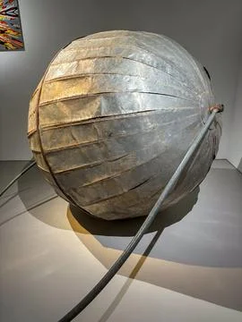 Metallic spherical object with segmented panels Stock Photos