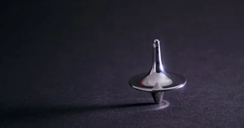 Metallic Spinning Top. Stock Footage 329612879
