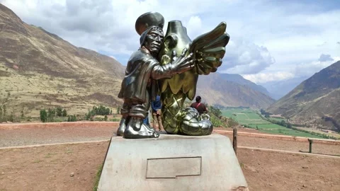 Metallic statue of a man hugging a bird like creature near Cusco, Peru. Stock Footage 288402376