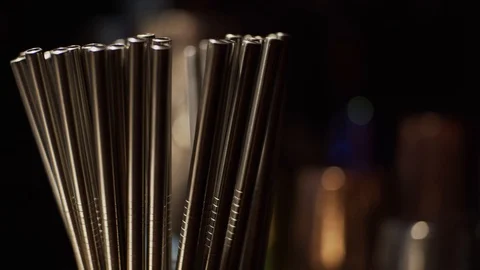 Metallic straws at bar Stock Footage 123542989