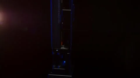 Metallic Technical Component in Blue and Pink Light, Dark Studio, Low Key Video stock 341495616