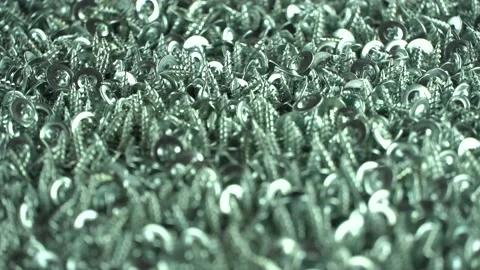 Metallic texture background. Video with selective focus. Background of the bolts Stock Footage 140869310